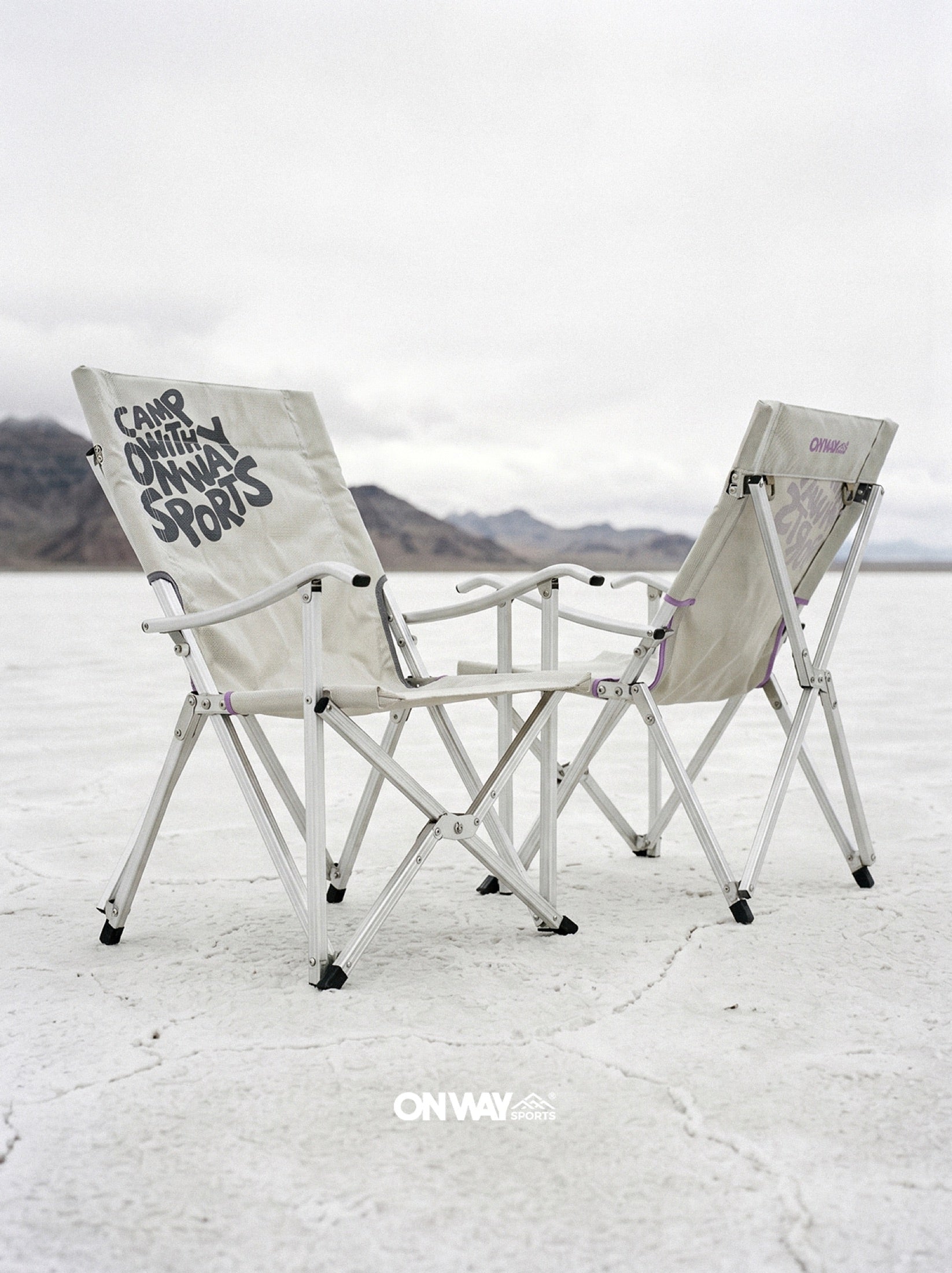 Onway Sports high-back folding camp chairs on a white salt flat