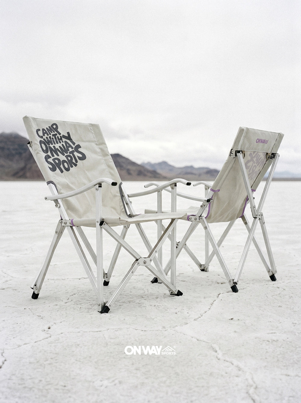 Onway Sports high-back folding camp chairs on a white salt flat